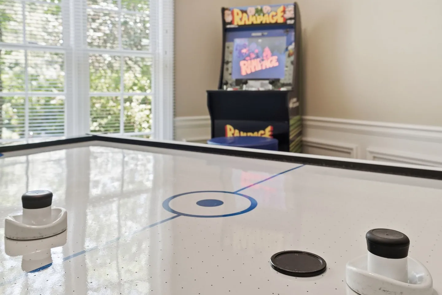 Game room with shuffleboard table